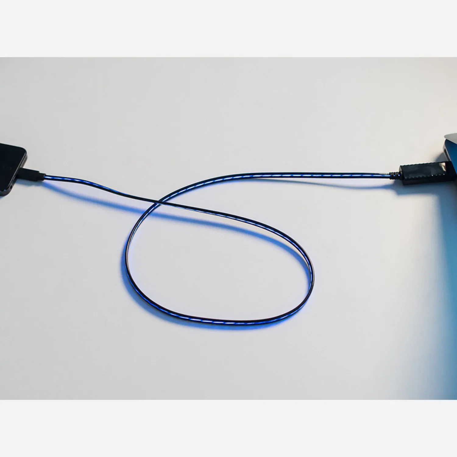 Photo of Flowing Effect iOS Lightning Cable - Black w/Aqua EL